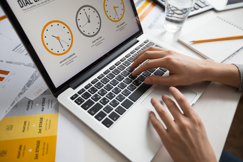 hands-businesswoman-using-laptop-office